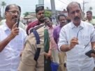 പോളിങ് ബൂത്തിനടുത്ത് ഫ്ലെക്സ് ബോർഡുകൾ: എംഎൽഎയും പൊലീസും തമ്മിൽ തർ‌ക്കം